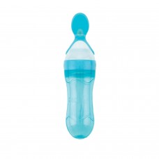 Nuby - Cuillère en 2 étapes Squeeze Feeder™ en silicone - Turquoise
